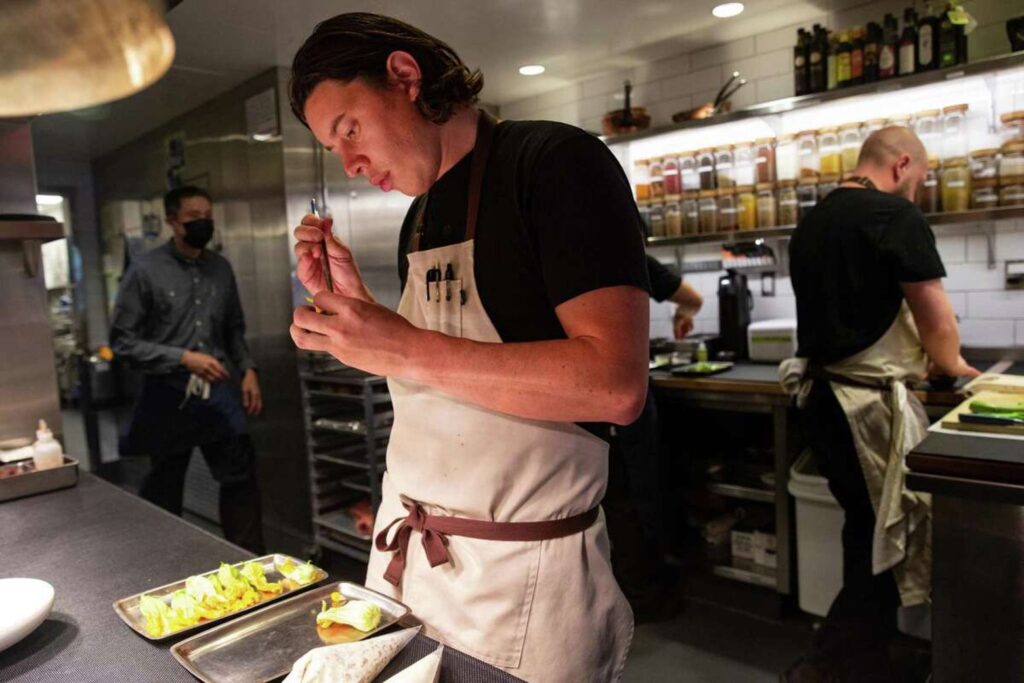 Chef Alex Hong prepares food in the kitchen of his restaurant, Sorrel. The San Francisco restaurant is the first in the Bay Area to sell seaweed bacon from Umaro Foods.
Jana Asenbrennerova/Special to The Chronicle