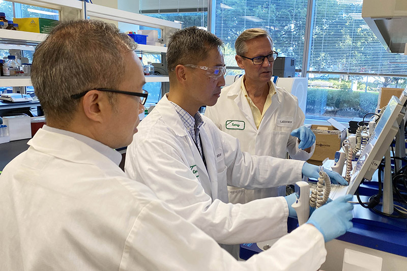 Derek Sims, Cornell Mallari, and Terry Hermiston of Coagulant in the lab