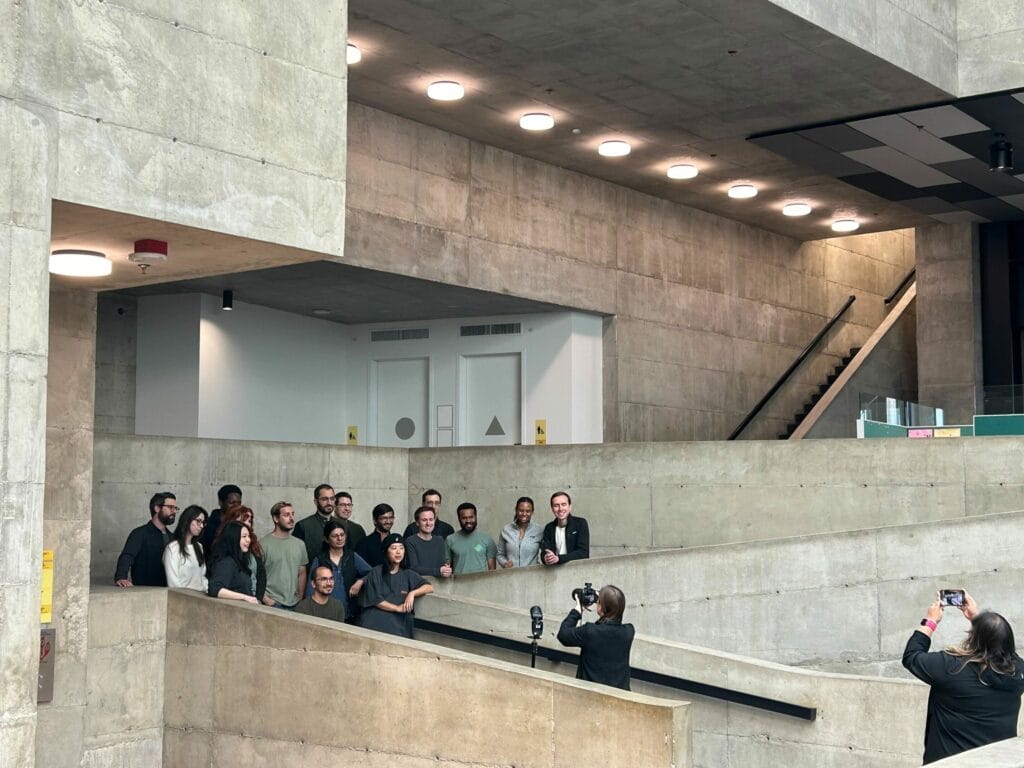 NY Times photographer Rachel Bujalski takes a photo of the Profluent team at BBH